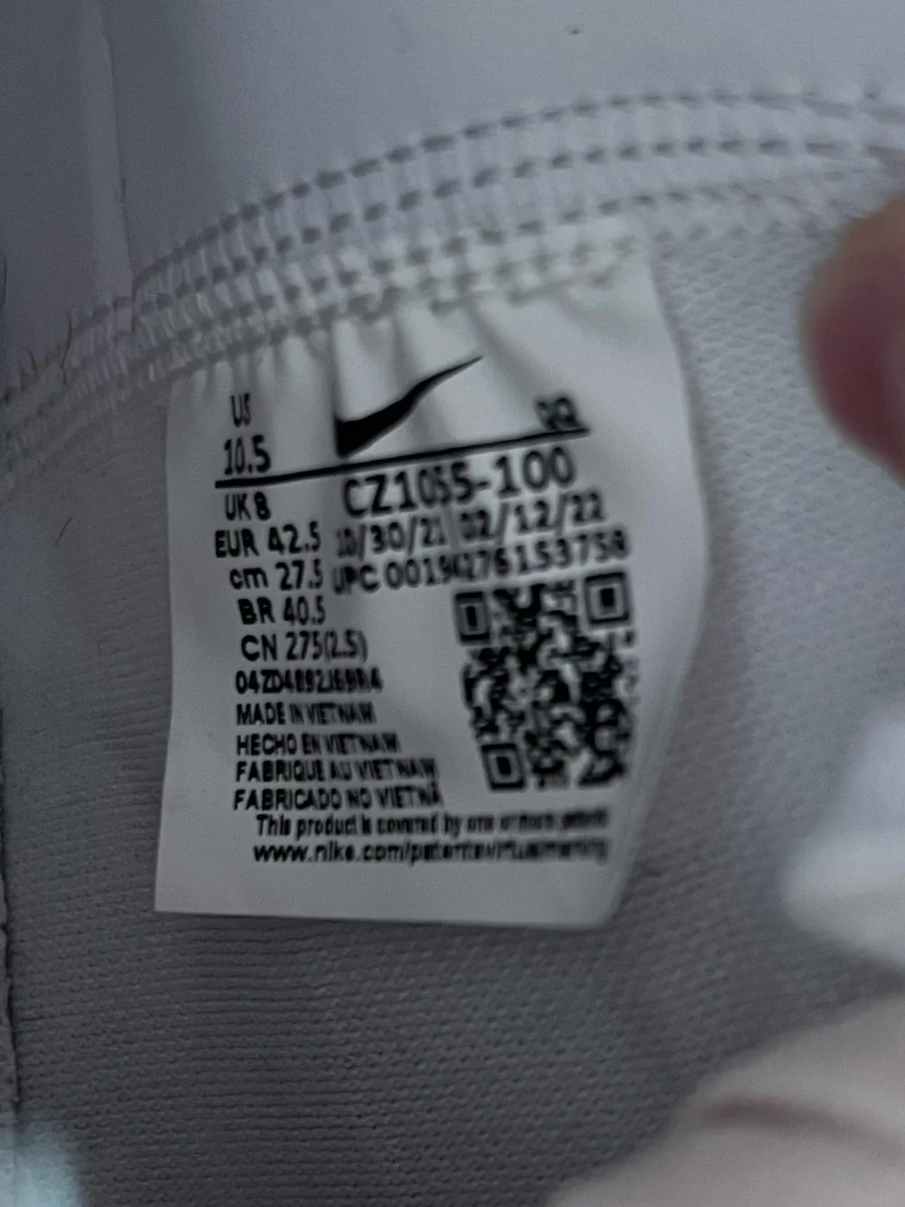 Nike White High-Top Sneaker with Black Swoosh - Picture 4 of 4